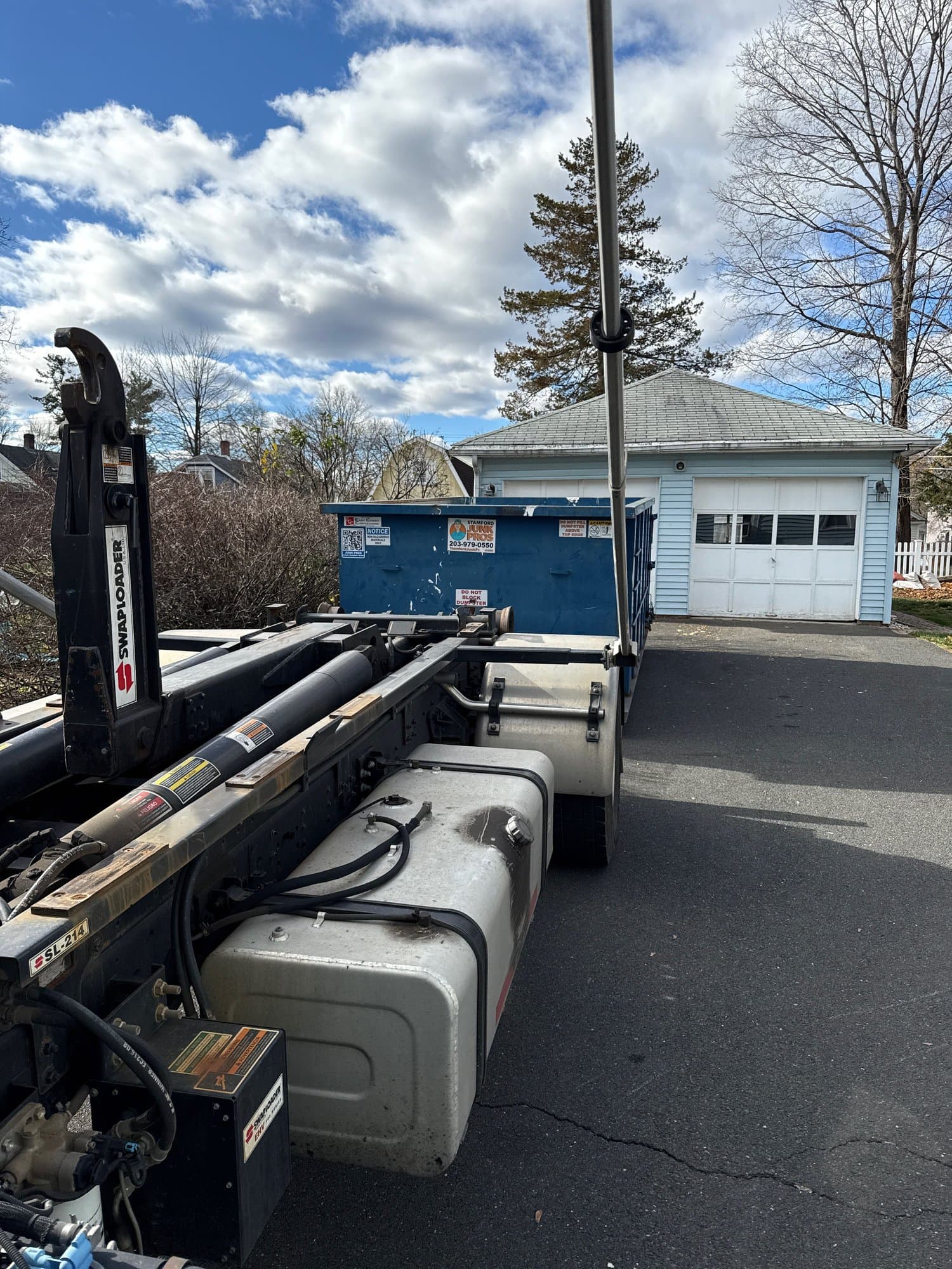 dumpster-rental-truck-delivery in Bristol, CT by Grizzly Junk Pros