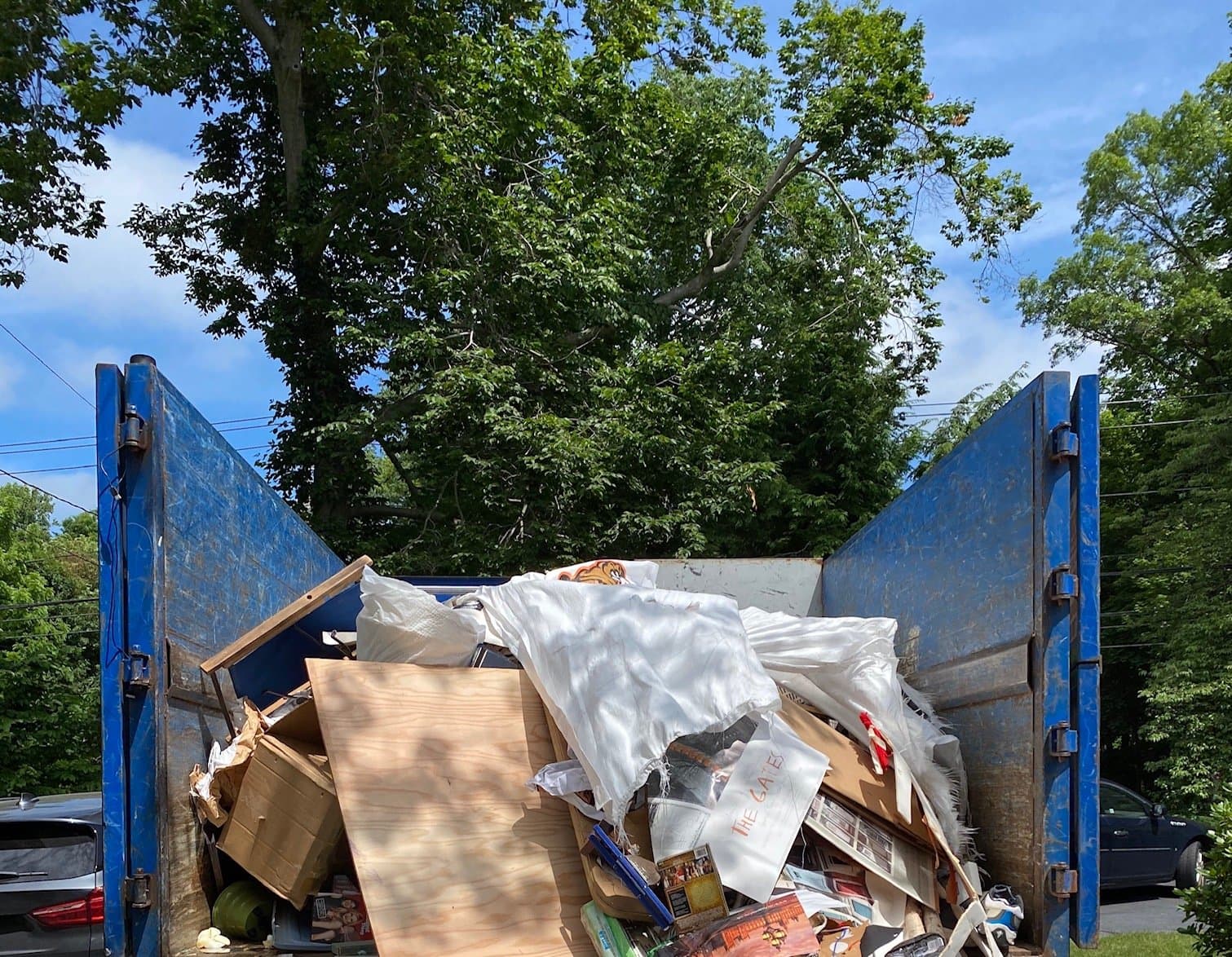 loaded junk truck in Darien, CT by Grizzly Junk Pros