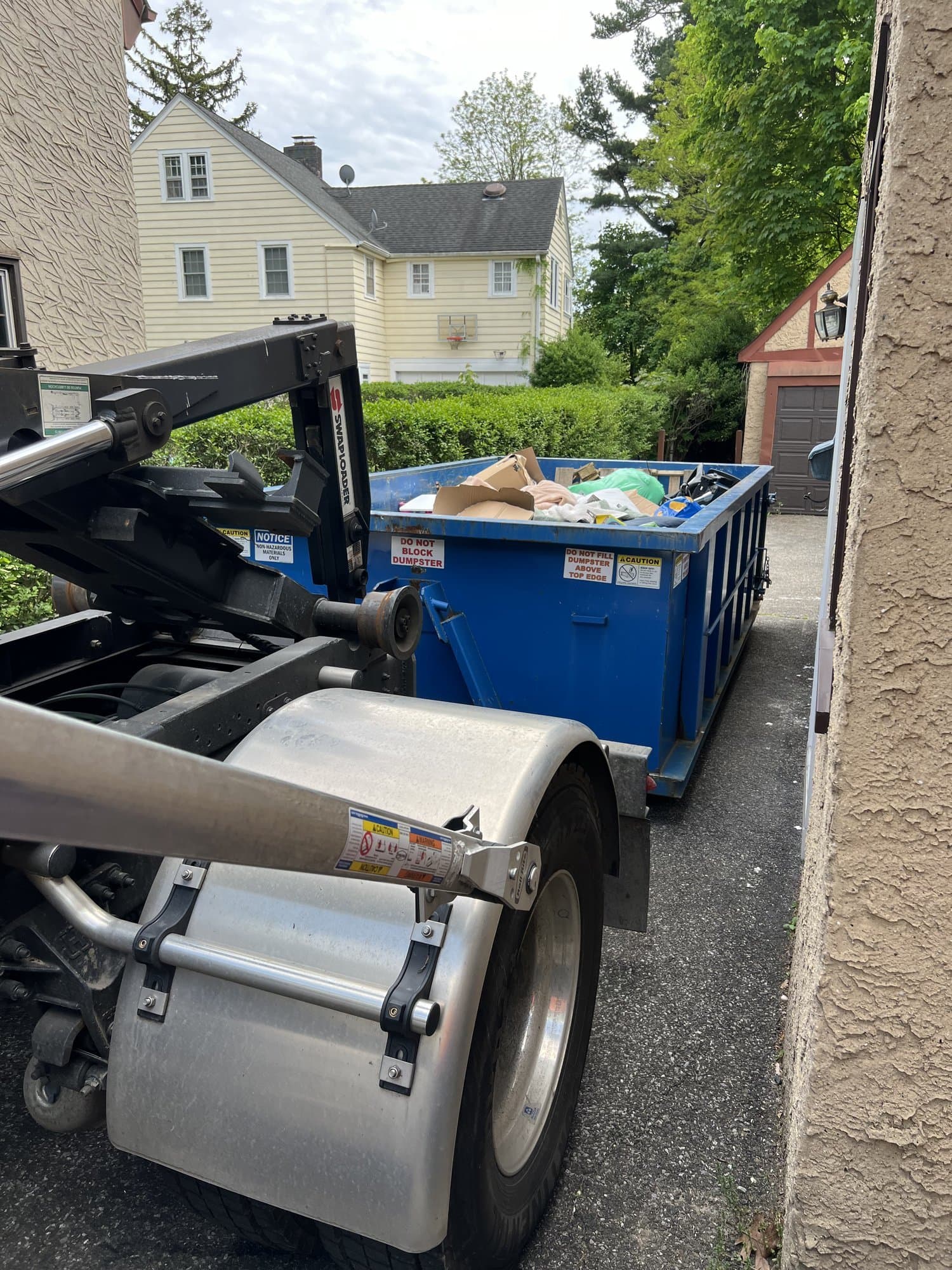 Roll-off dumpster delivery in New London County by Stamford Junk Pros