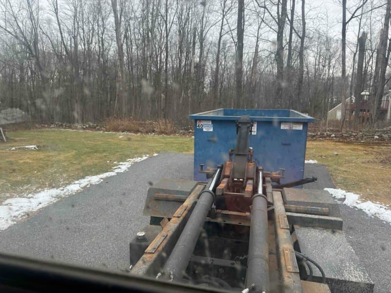 dumpster delivery hookup in Hartford, CT by Grizzly Junk Pros