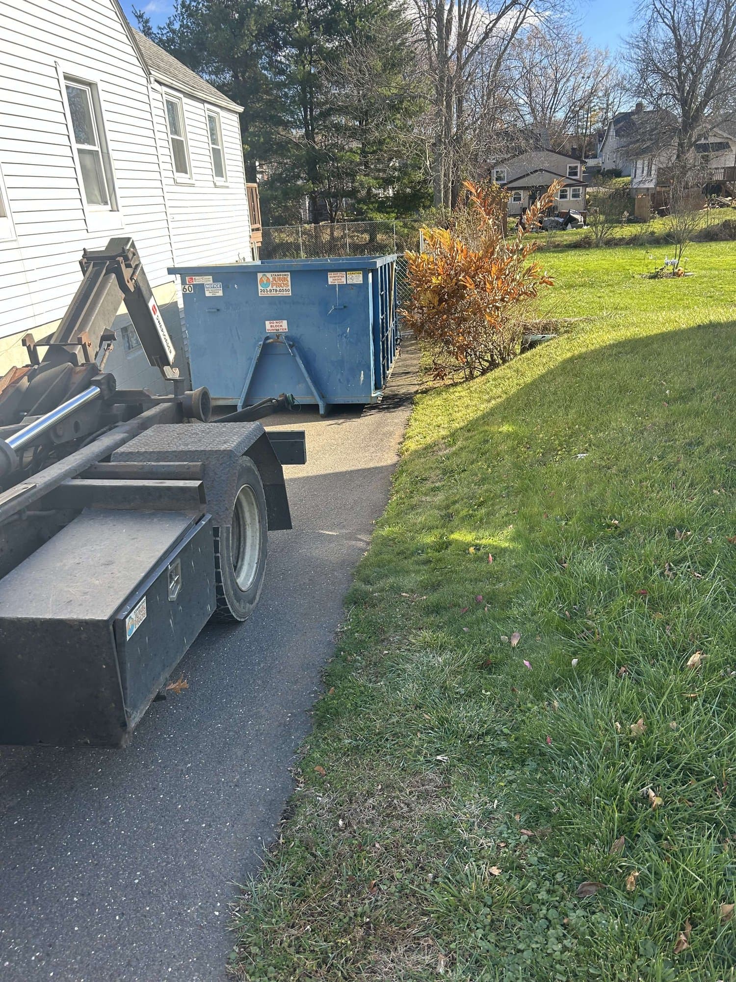 dumpster-truck-delivery in Meriden, CT by Grizzly Junk Pros