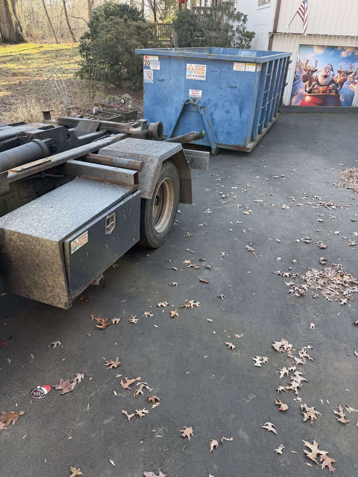 dumpster and equipment delivery in Norwalk, CT by Grizzly Junk Pros