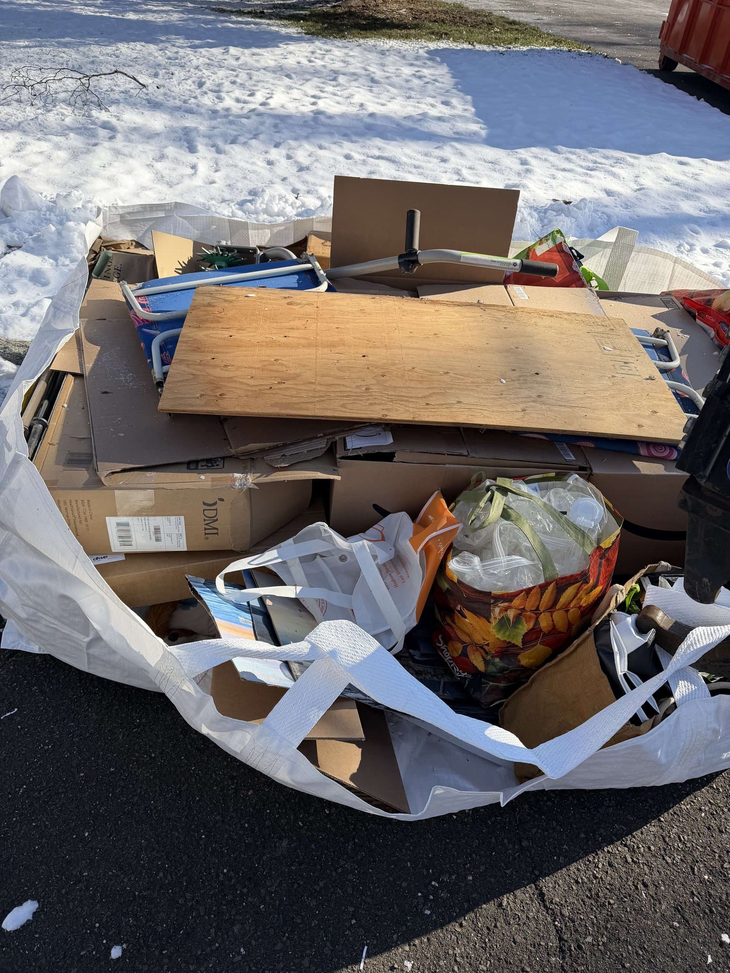 dumpster debris load in Norwalk, CT by Grizzly Junk Pros