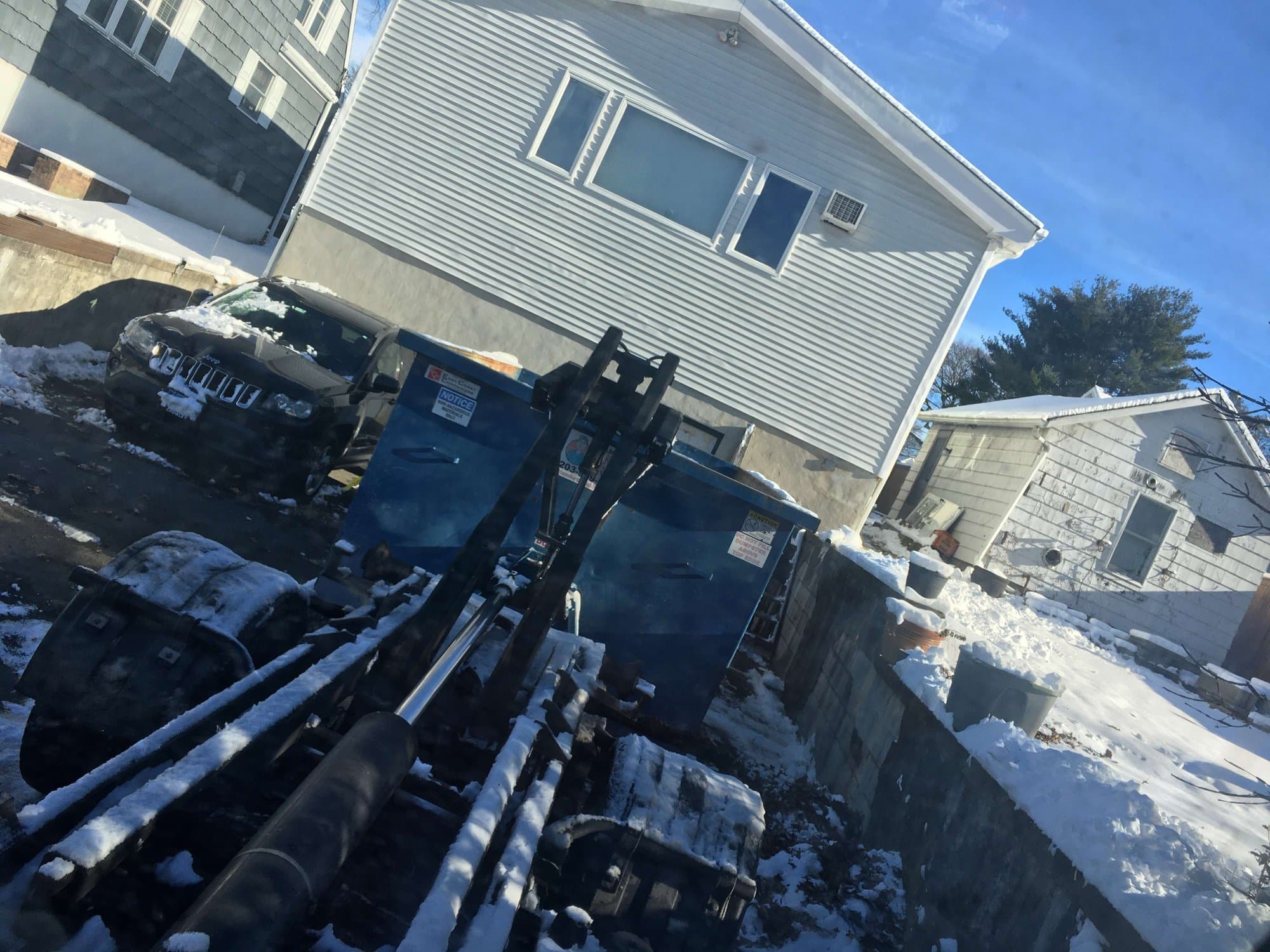 dumpster-truck-loading in Norwalk, CT by Grizzly Junk Pros