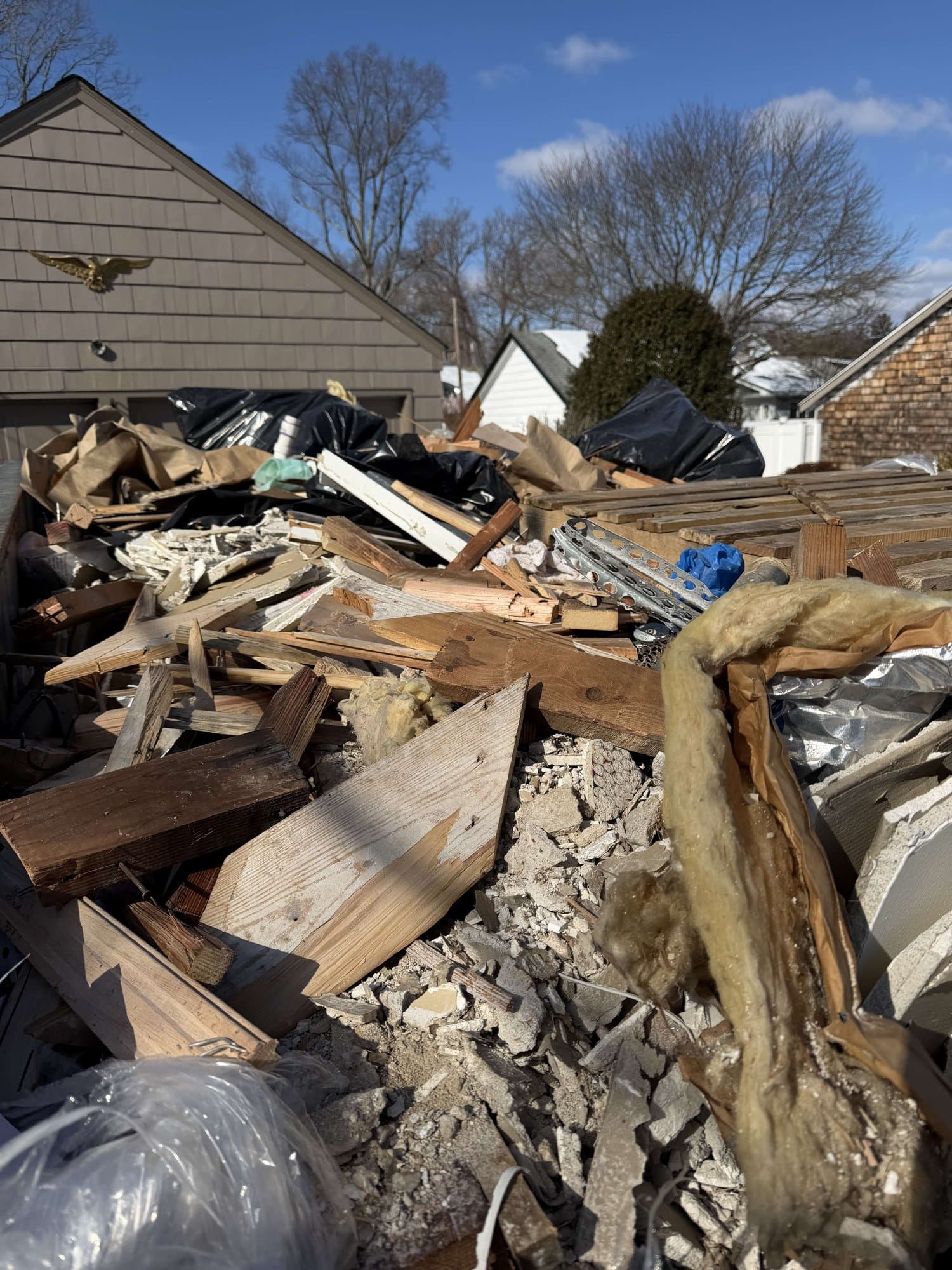 demolition debris pile by Grizzly Junk Pros
