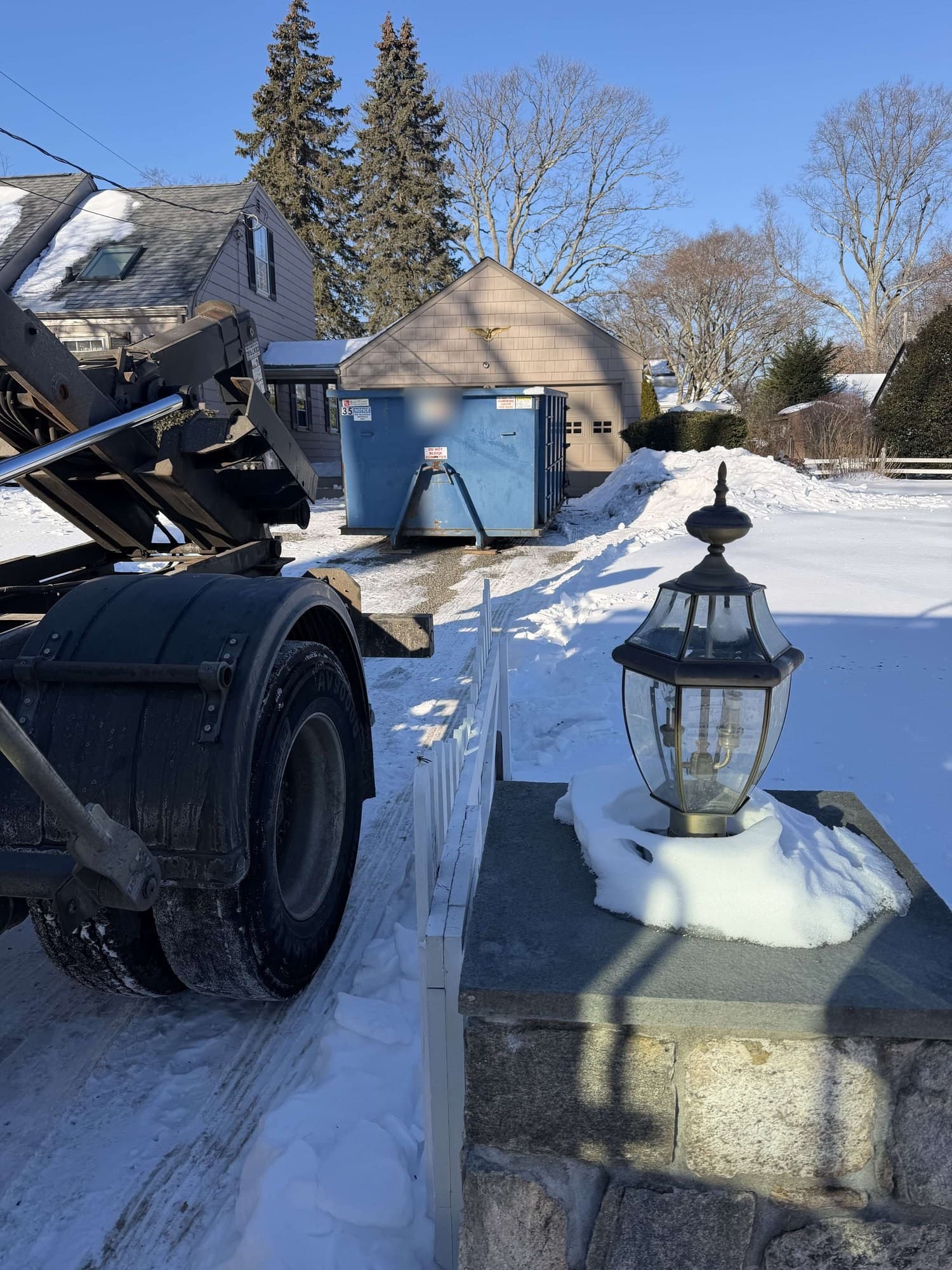 dumpster rental winter by Grizzly Junk Pros