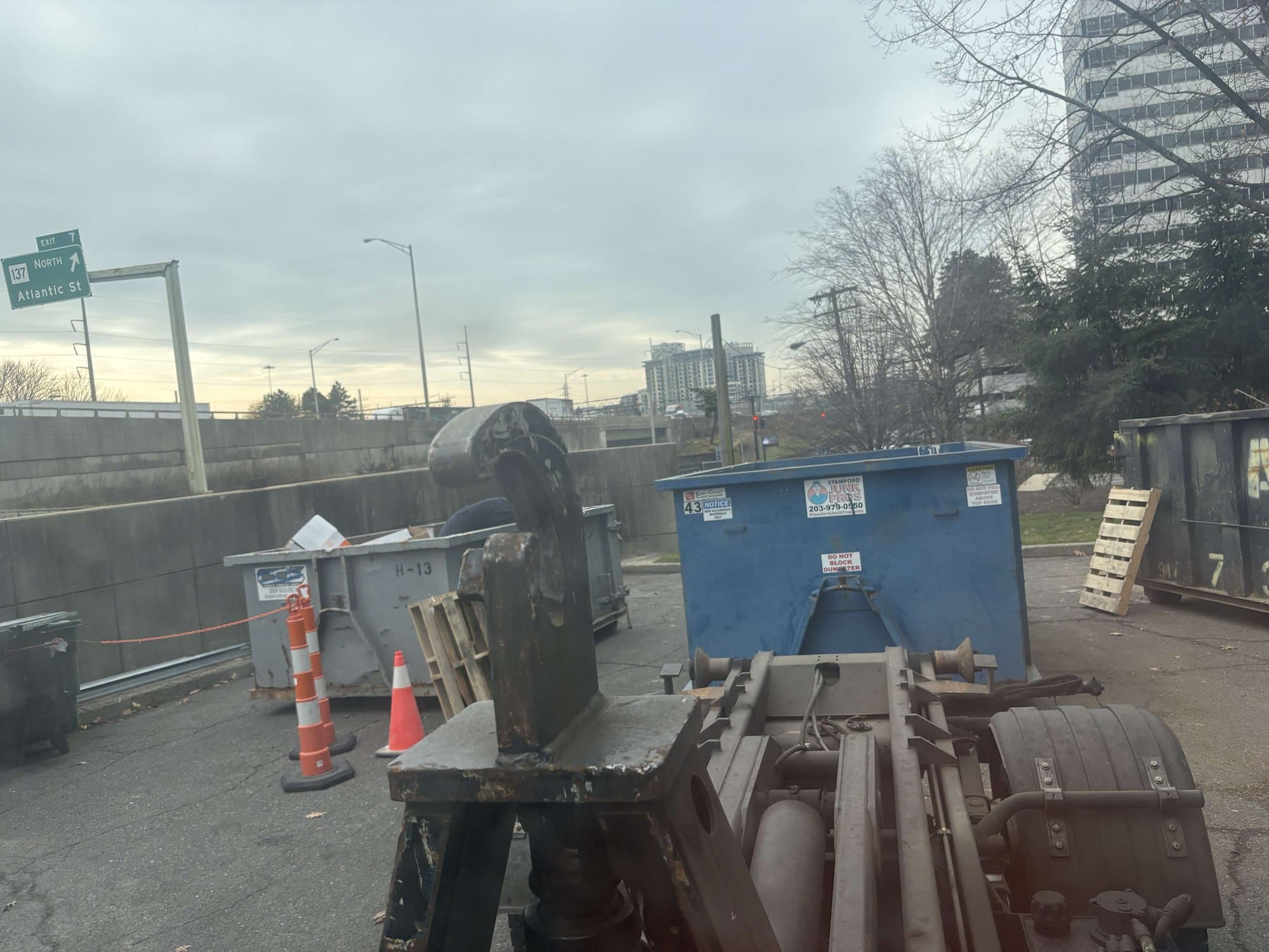 dumpster-truck-jobsite in Stamford, CT by Grizzly Junk Pros