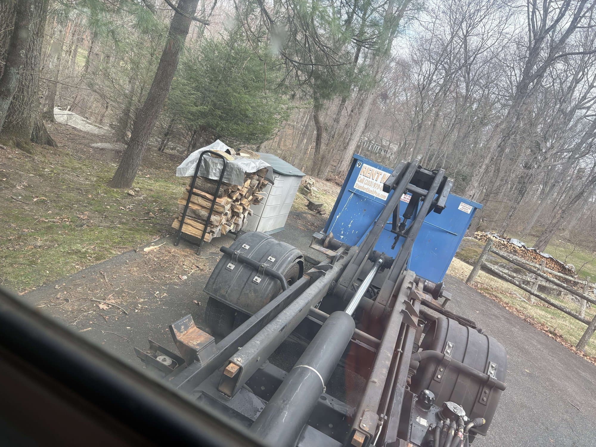 dumpster-truck-loaded in Stamford, CT by Grizzly Junk Pros