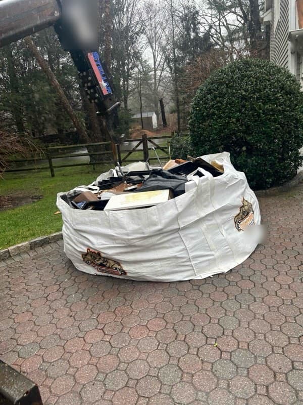 debris removal bag by Grizzly Junk Pros