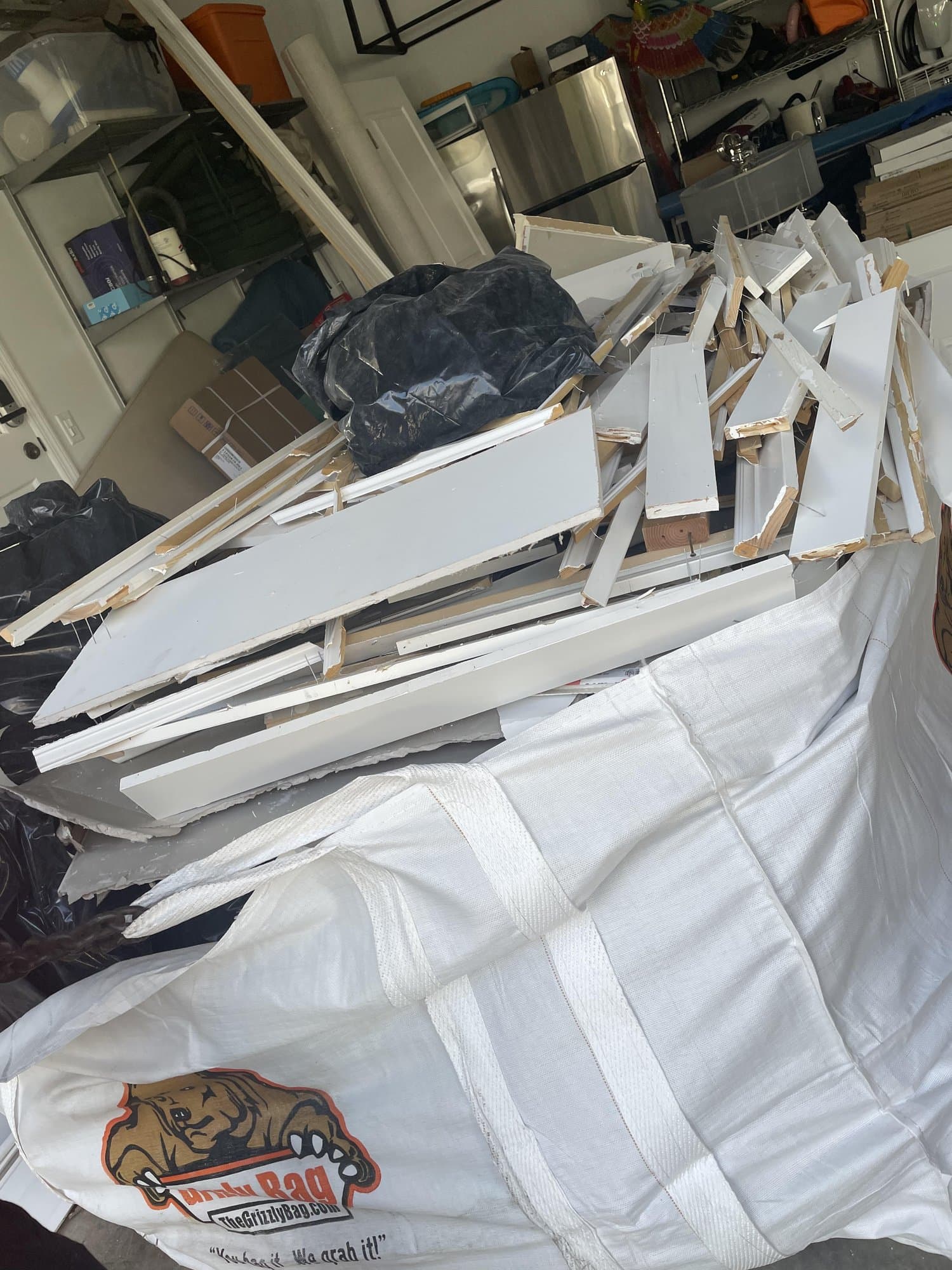 garage cleanout debris by Grizzly Junk Pros