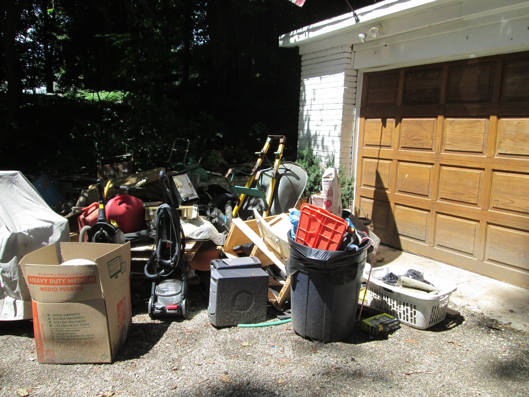 garage cleanout junk by Grizzly Junk Pros