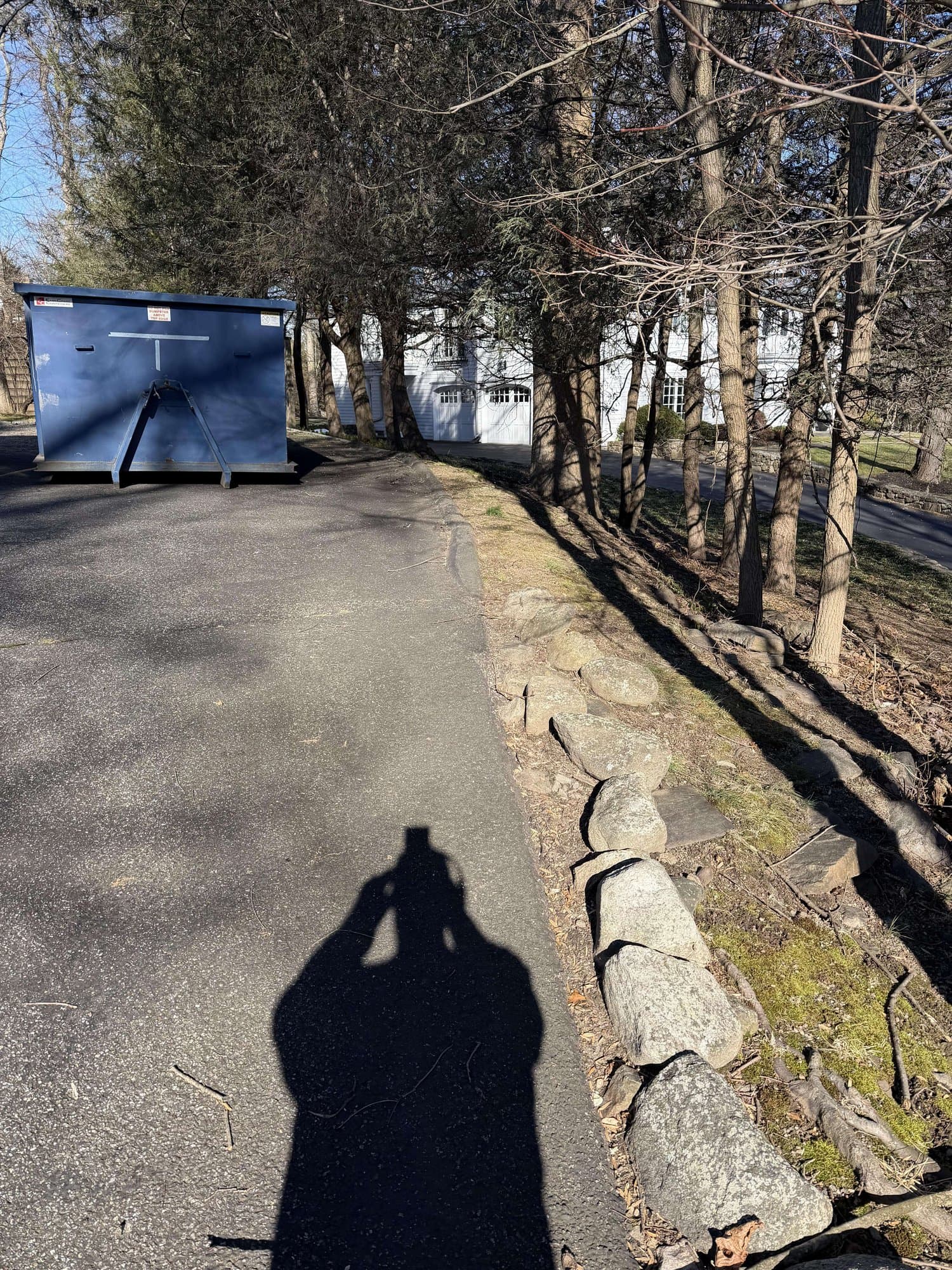 dumpster delivery driveway by Grizzly Junk Pros