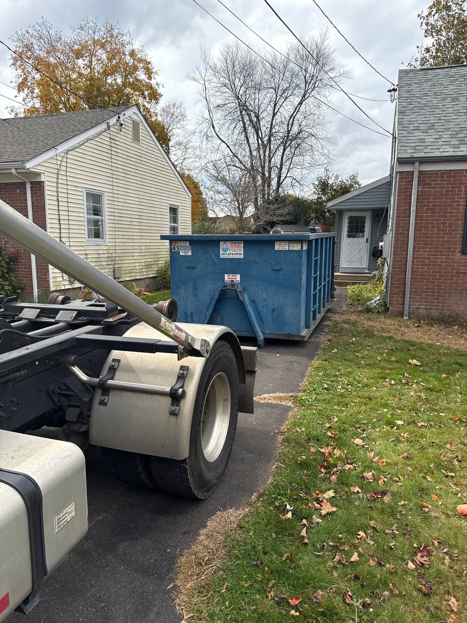 dumpster rental jobsite by Grizzly Junk Pros