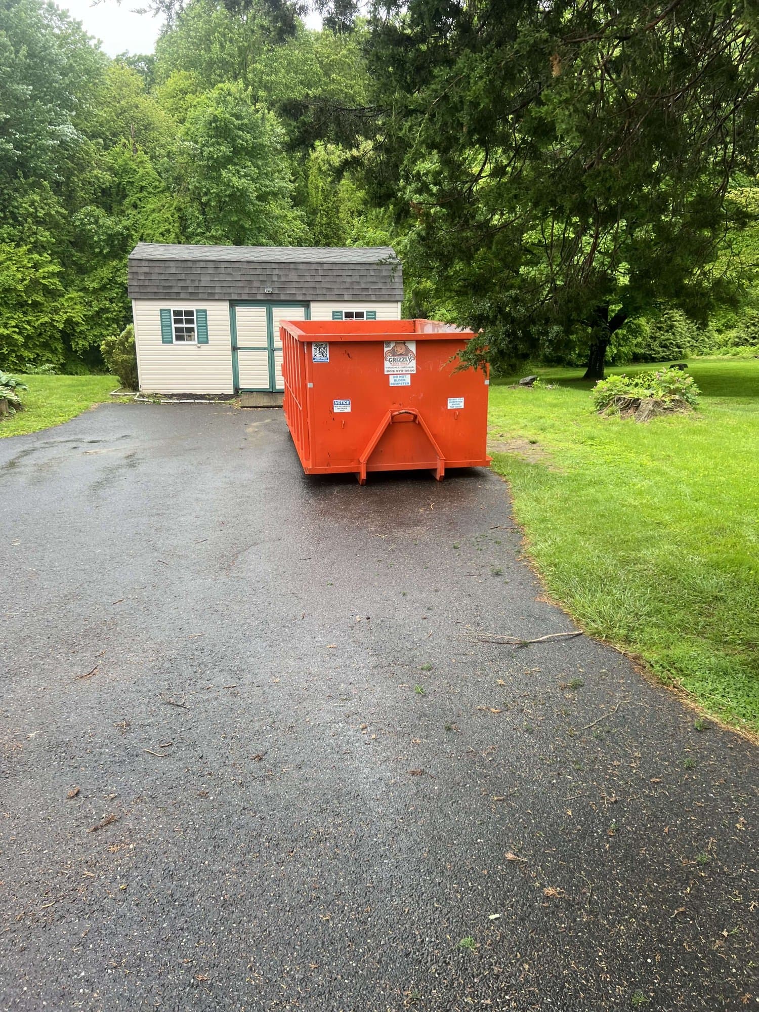 dumpster rental setup by Grizzly Junk Pros