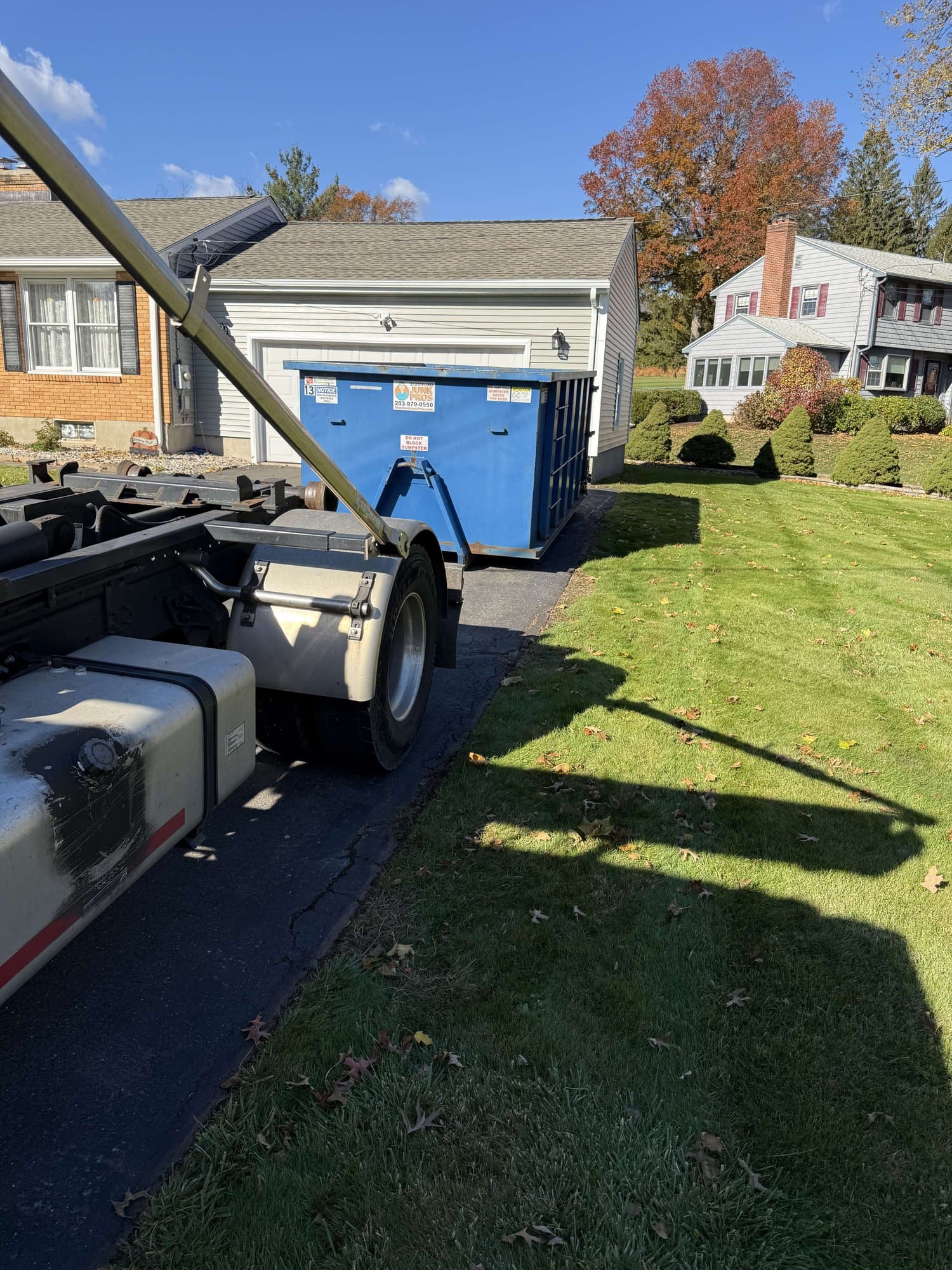 dumpster rental truck shot by Grizzly Junk Pros