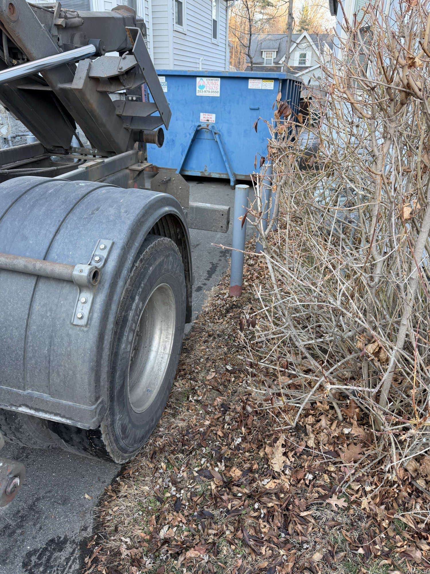 dumpster truck debris by Grizzly Junk Pros