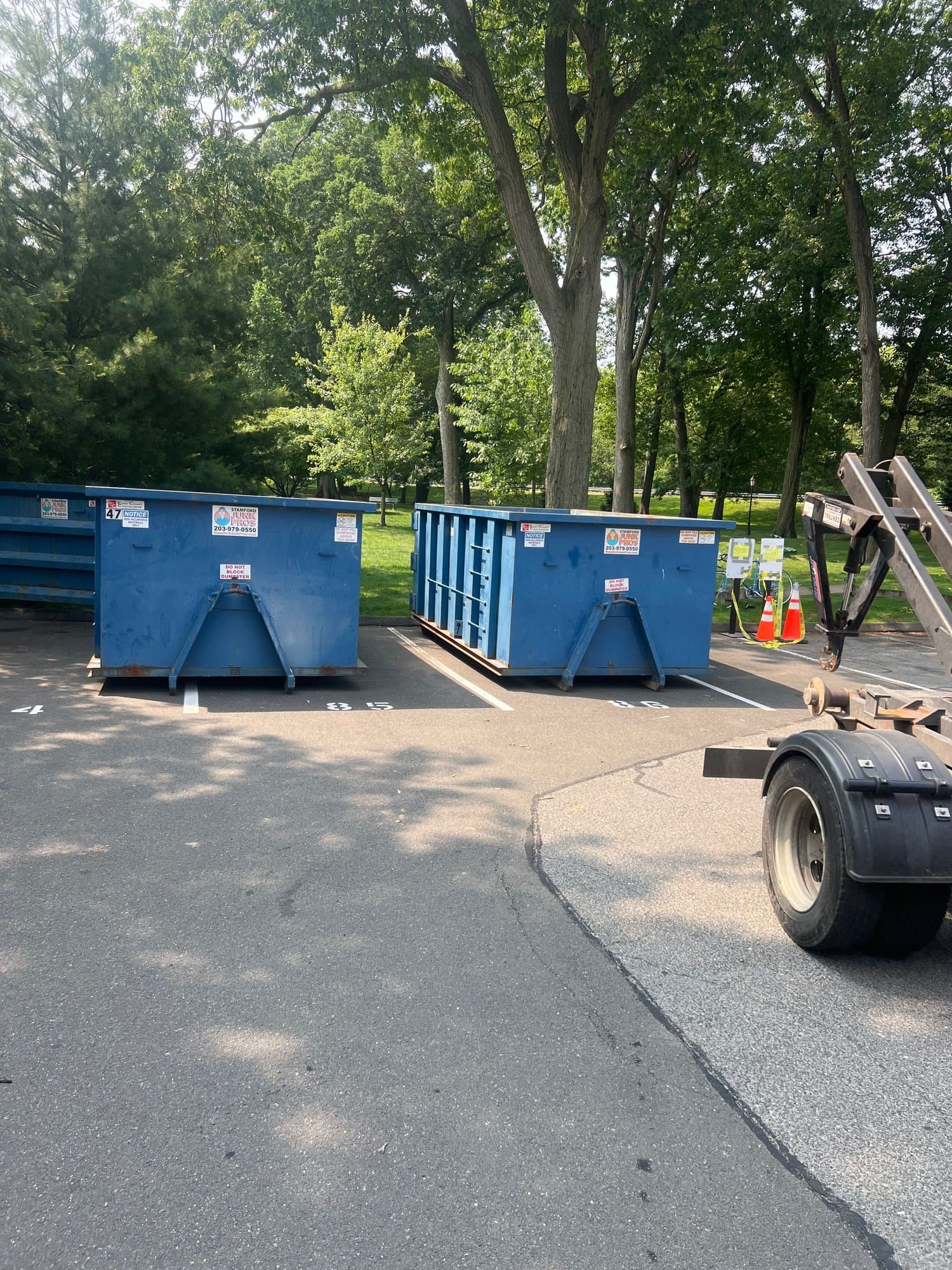 dumpsters parked ready by Grizzly Junk Pros