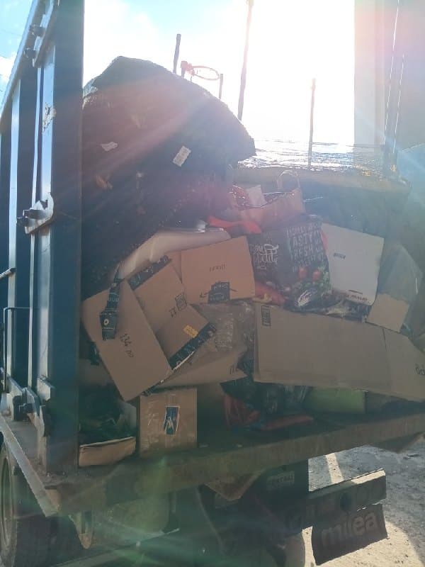 truck loaded junk by Grizzly Junk Pros