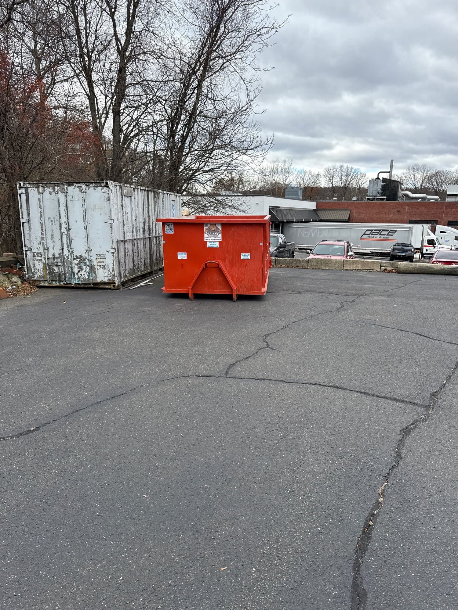 dumpster and trash containers in Waterbury, CT by Grizzly Junk Pros