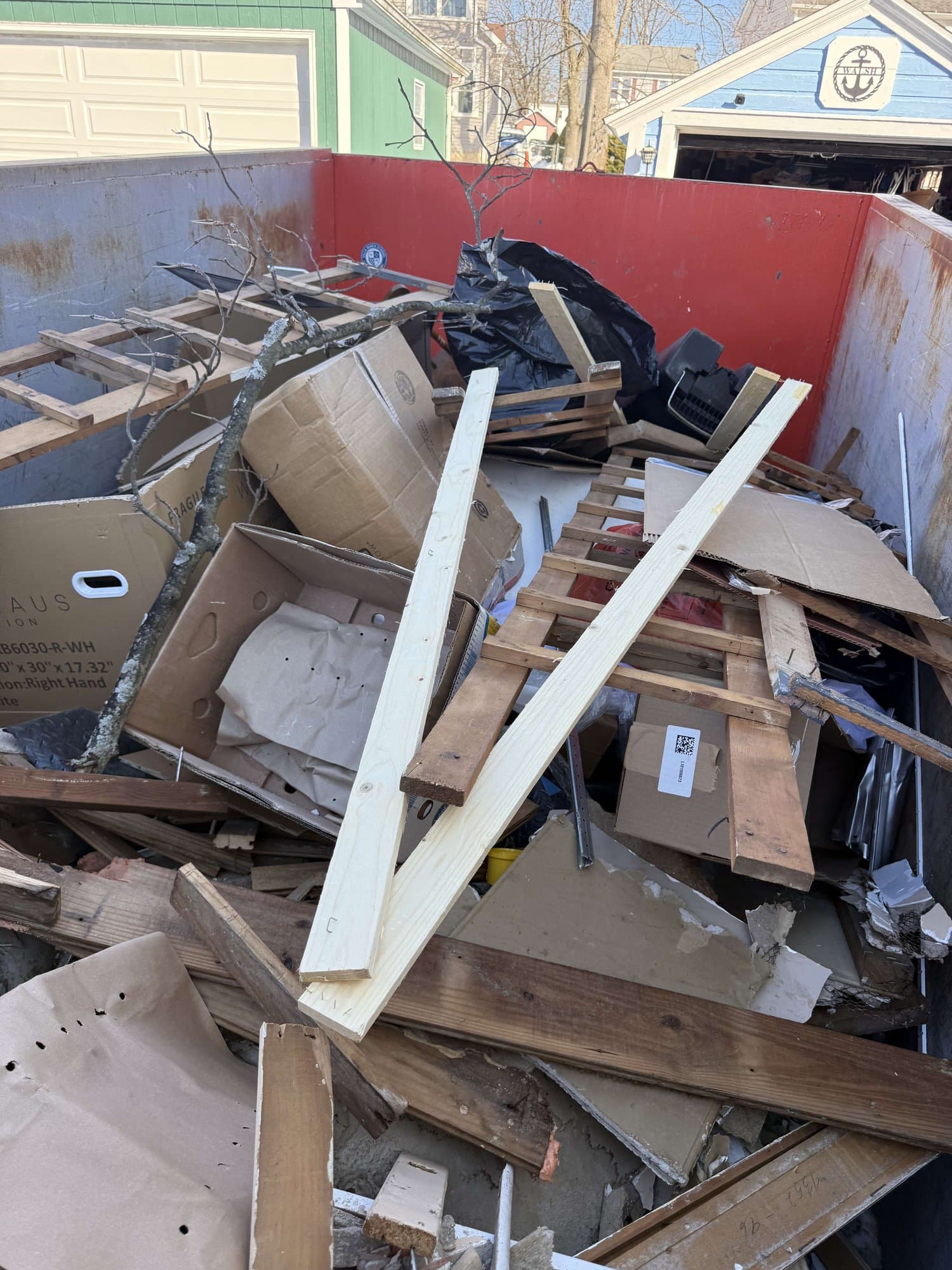 mixed debris dumpster in West Haven, CT by Grizzly Junk Pros