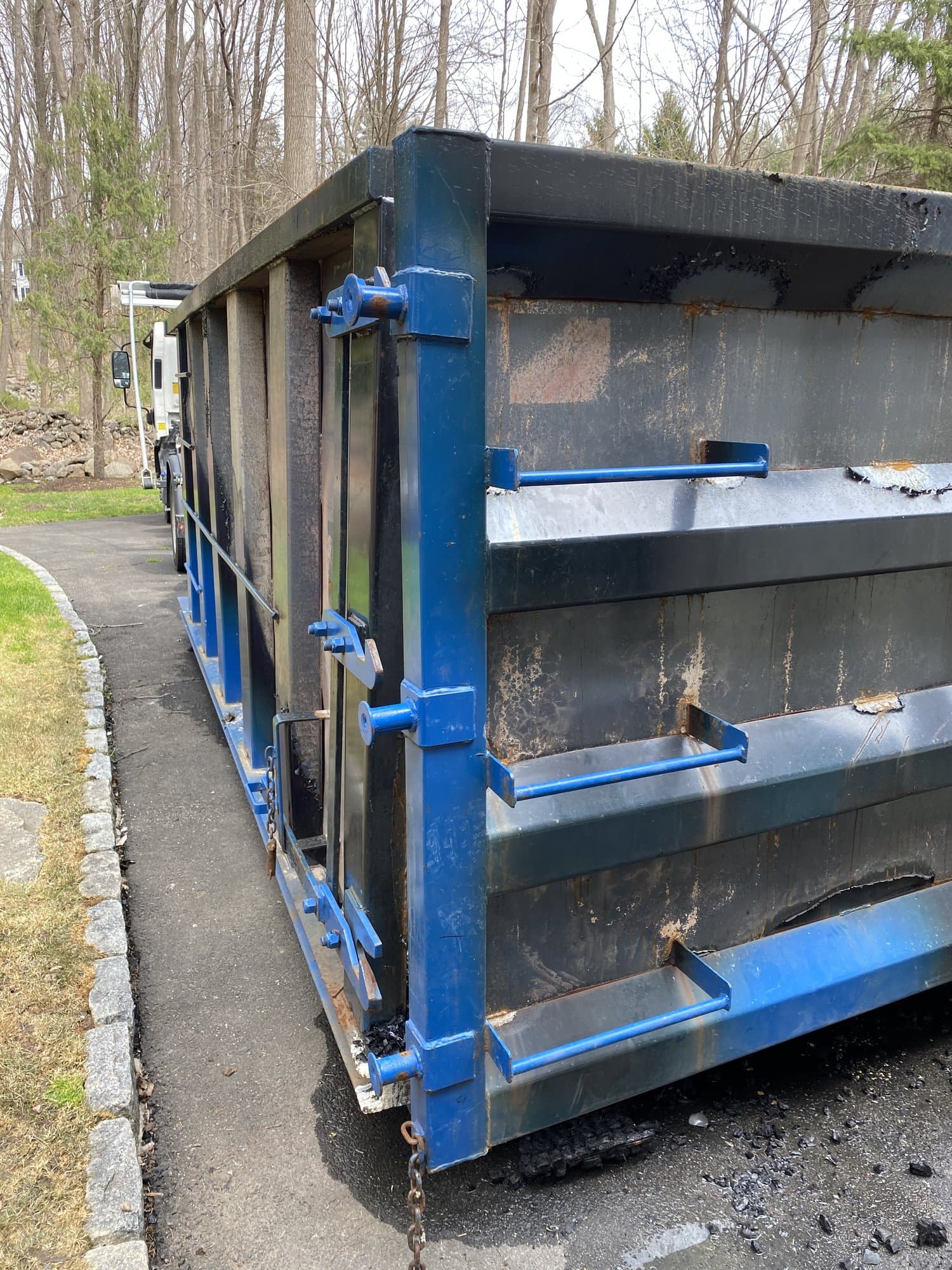 Roll-off dumpster truck in Weston, CT by Grizzly Junk Pros