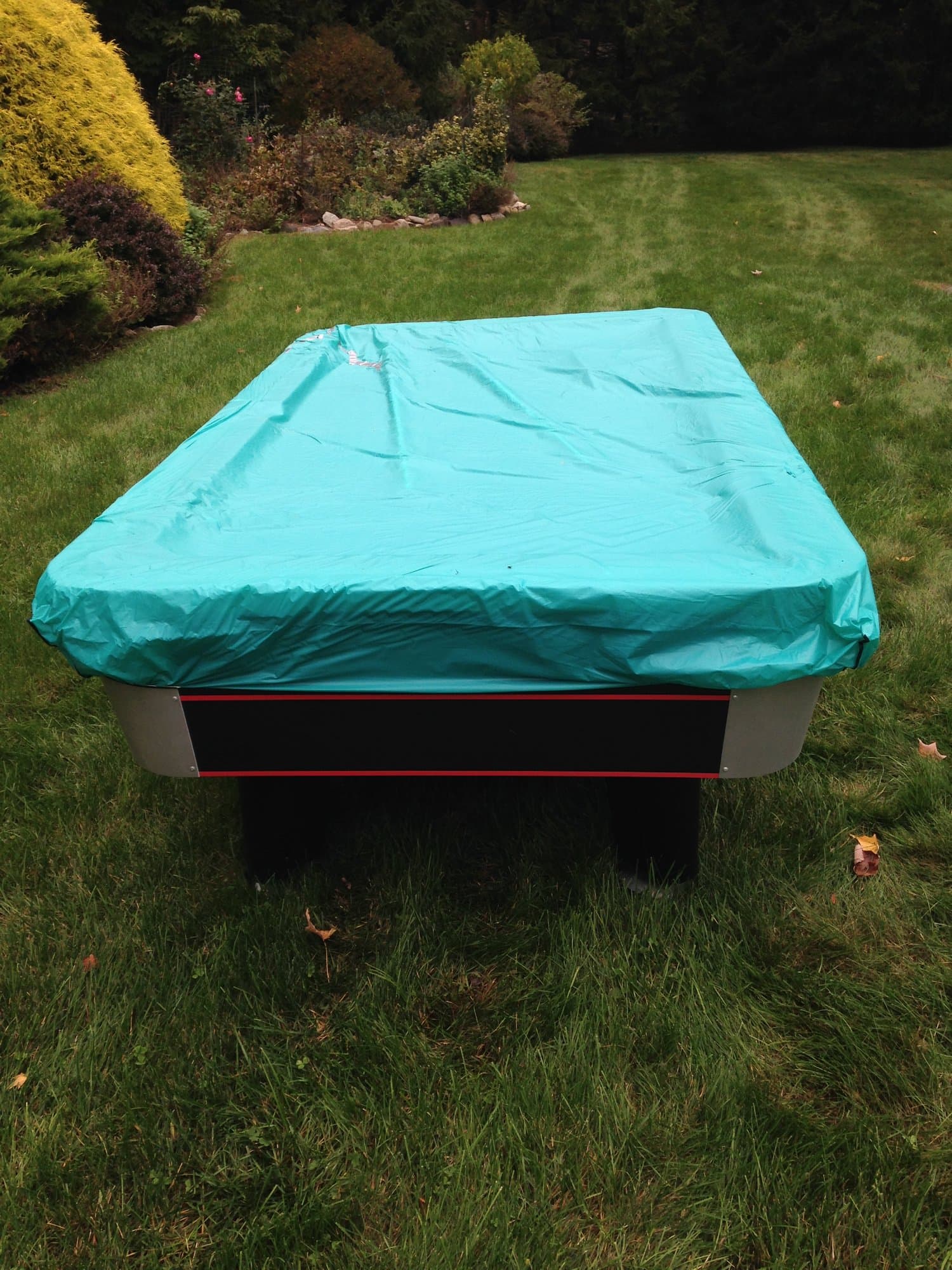 Covered hot tub in Wilton, CT ready for removal by Grizzly Junk Pros