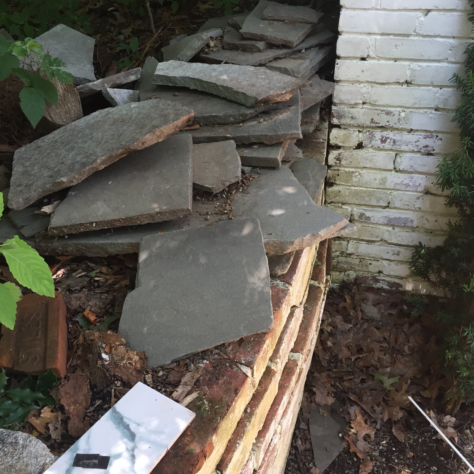 slate-shingles-lumber-pile in Wilton, CT by Grizzly Junk Pros